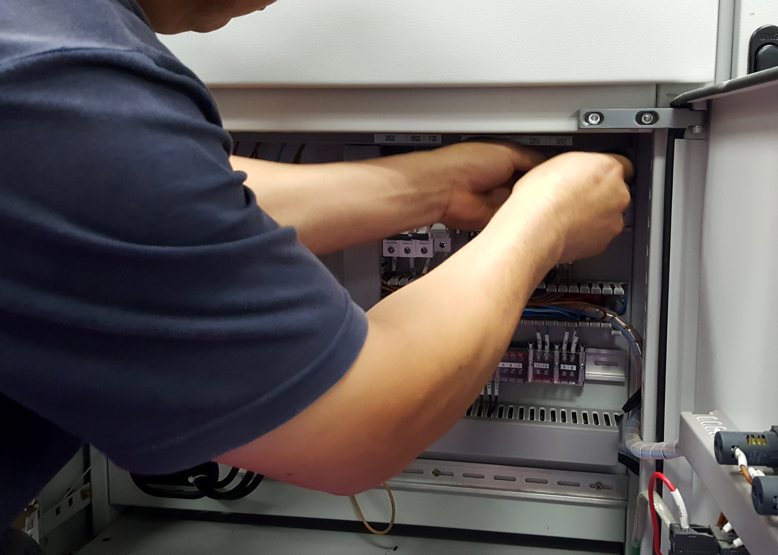 Wiring,Control,Cable,Work,By,An,Electrician,At,Low,Voltage